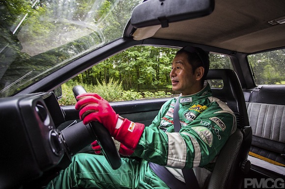 Keiichi Tsuchiya driving Toyota Corolla AE86