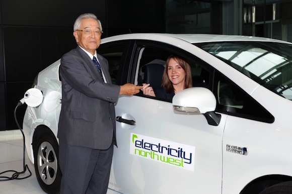 Dr Shoichiro Toyoda hands over the first Prius Plug-in hybrid