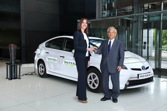 Dr Shoichiro Toyoda hands over the keys to the first Prius Plug-in hybrid