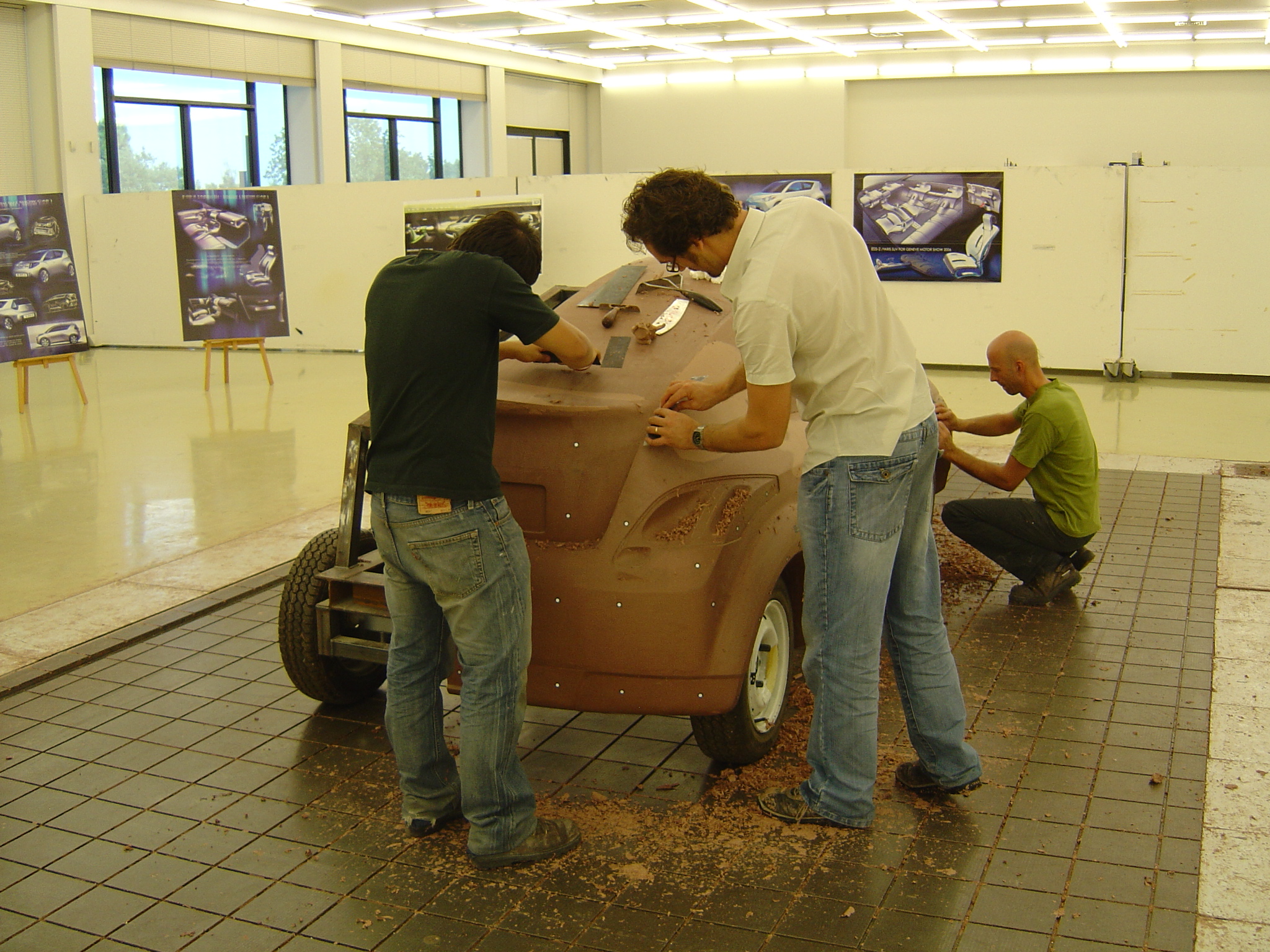 Car designers sculpting clay at ED2