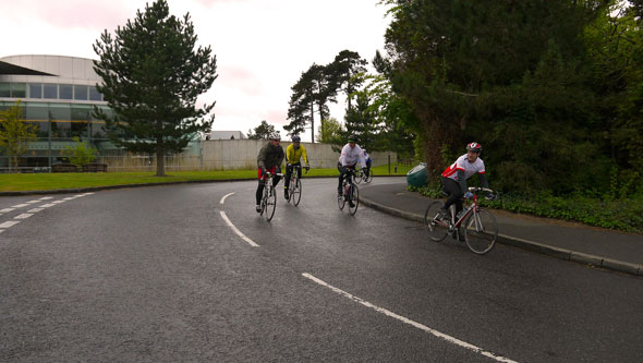 cycling-round-a-car