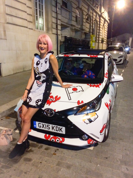 Model with The Rodnik Band dress Toyota Aygo for London Fashion Week