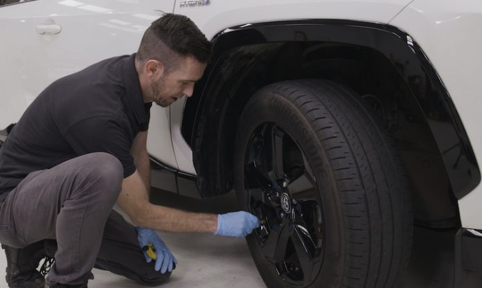 checking tyre pressure