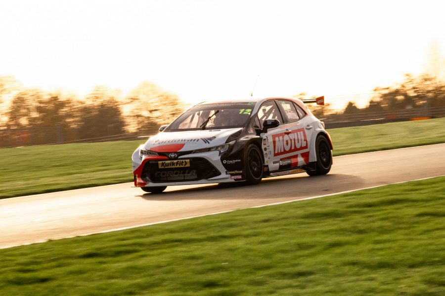 Toyota Corolla touring car on track at Donington Park race circuit