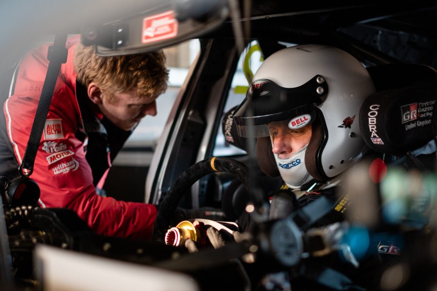 Toyota's Jason Stanley sits in the driving seat of a Toyota Corolla touring car