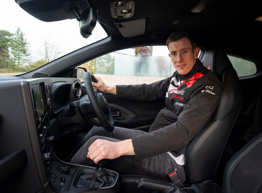 Elfyn Evans sitting in the driver's seat of his new Toyota GR Yaris