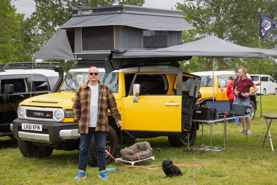 MR2 day Toyota FJ Cruisers in a field with a tuff trek tent